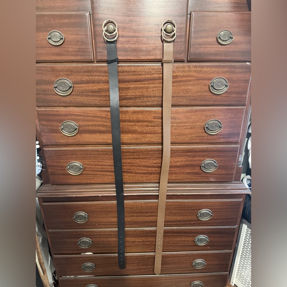 Two black and brown 45 inch belts.  Lightly used.  Gold buckle.